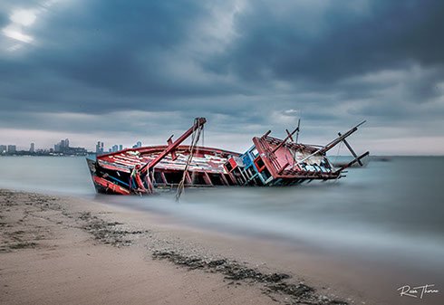 Thai fishing boat left out to decay