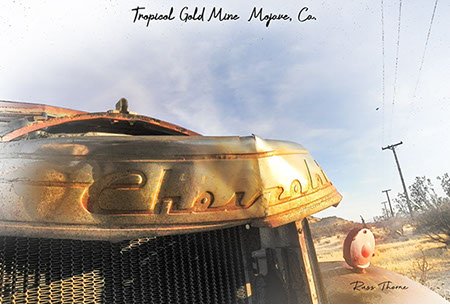 An early 1940s Chevrolet pickup, weathered and beaten, showing significant signs of damage and likely beyond repair.