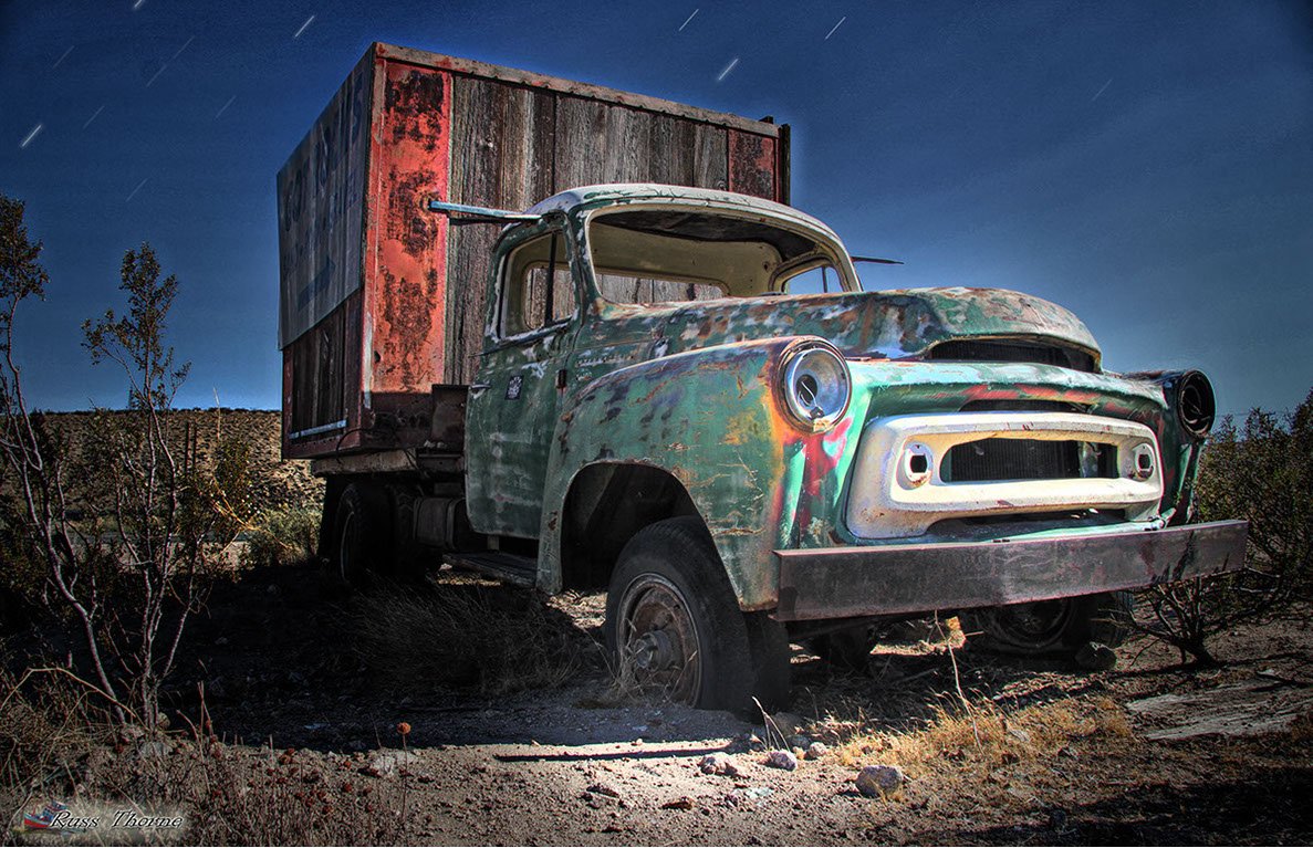 Near Mojave California, an old truck used as a bill board. photo by Russ Thorne
